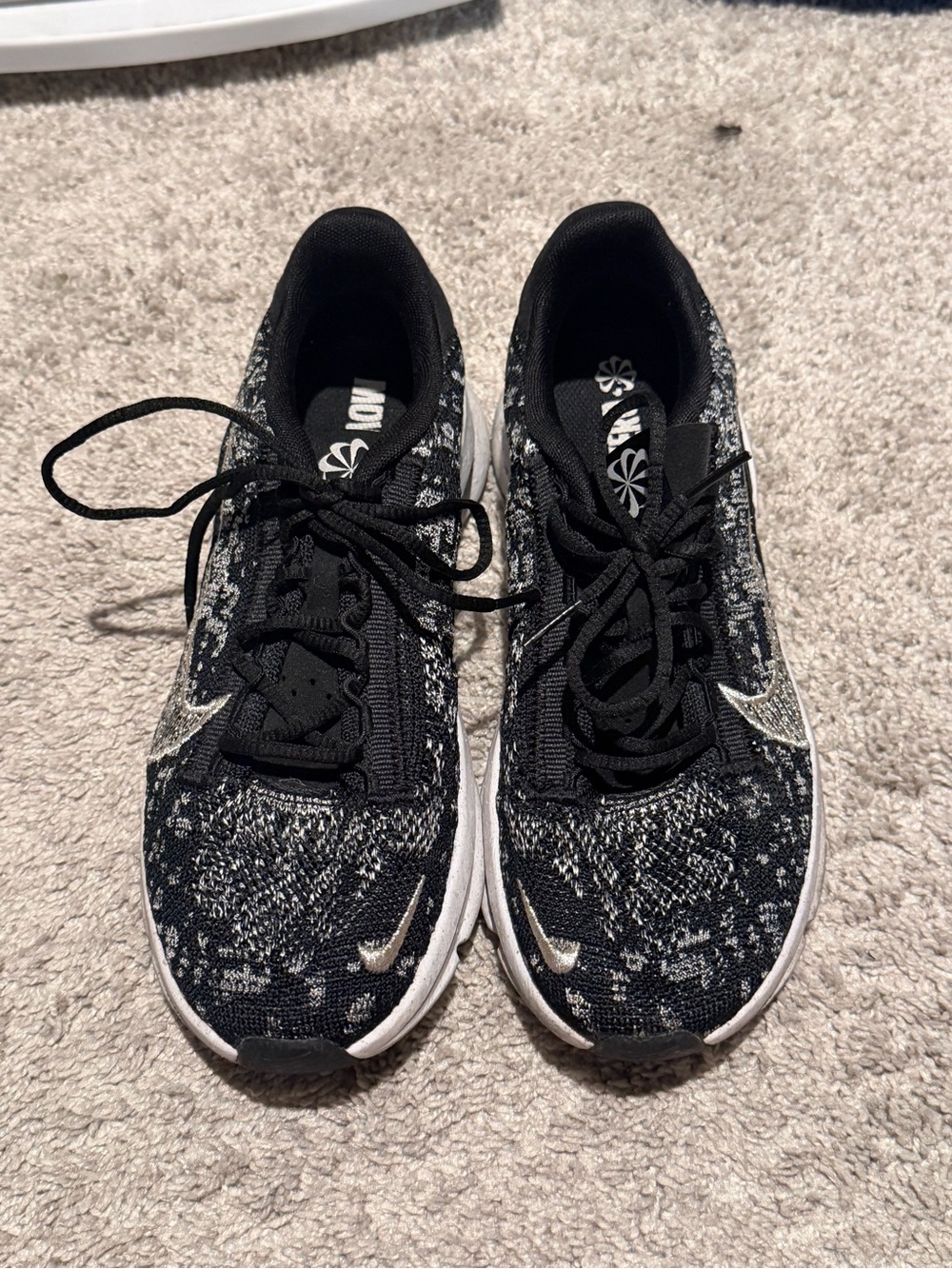 Size 8.5 Nike Women's Black and Silver Knit Running Shoes